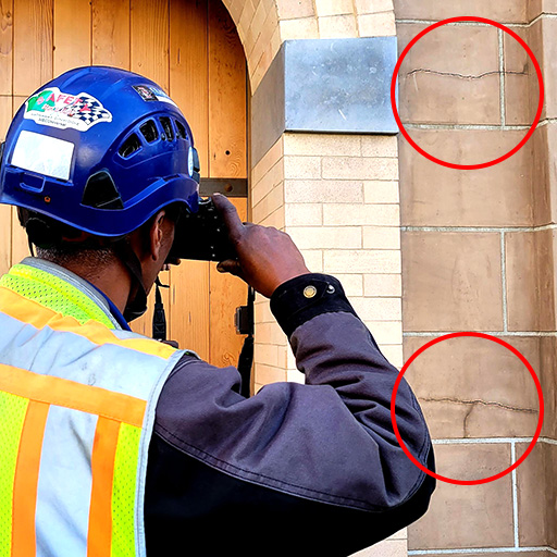 Inspector documenting cracks Pre-construction surveys reduce risk of property damage and litigation