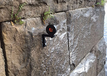 L-bar prism on bridge pier