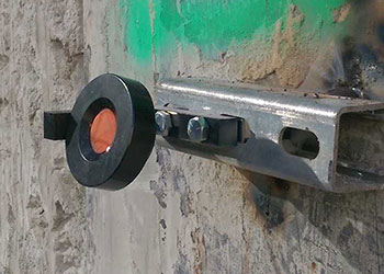 L-bar prism on welded bracket