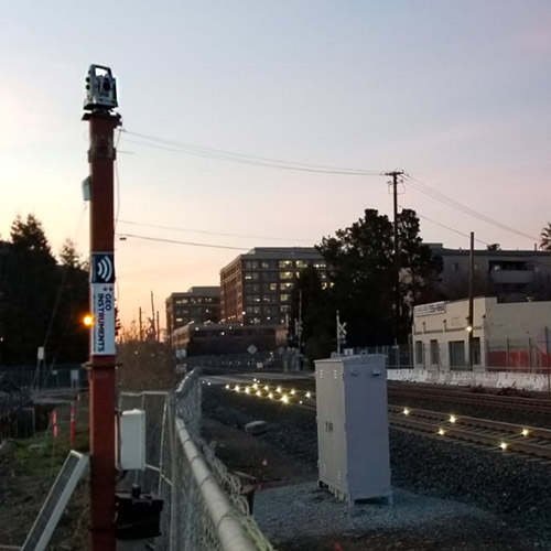 Rail clip prisms glowing at dusk